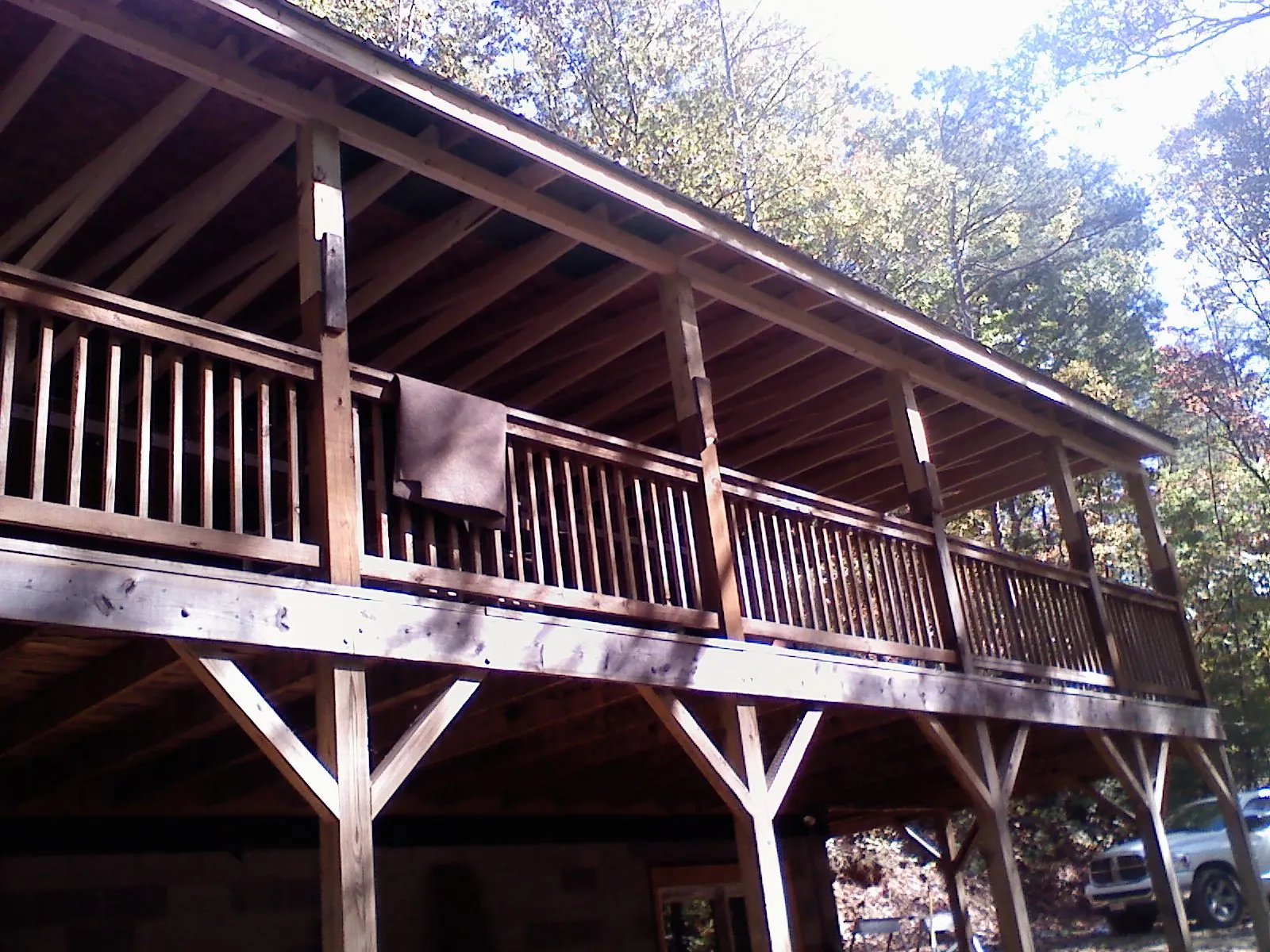 Timber framing under a new elevated porch and deck — Roof Leak Repair in Jersey by Roofing Brothers